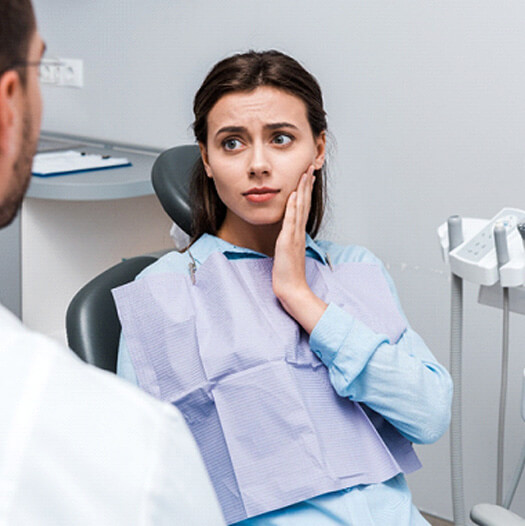 closeup of woman experience toothache