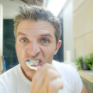 Man brushing his teeth