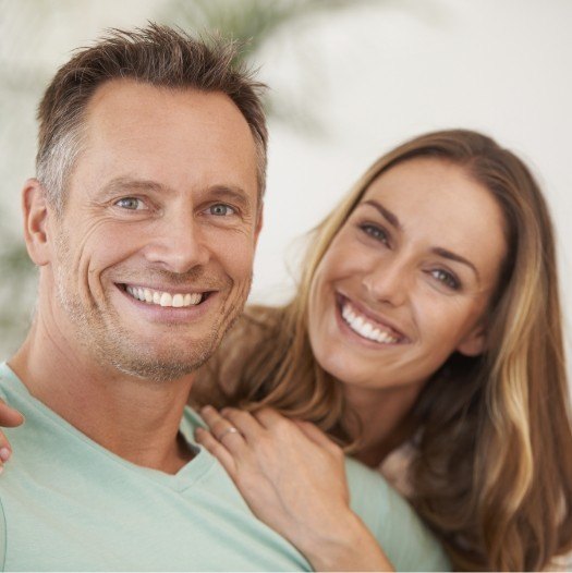 Man and woman smiling together